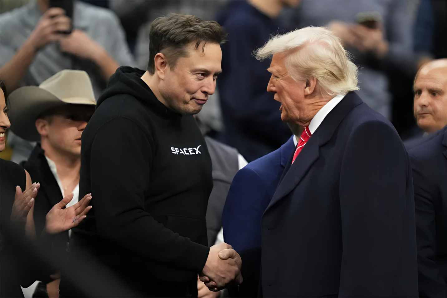 Musk says he went too far in attacks against Trump