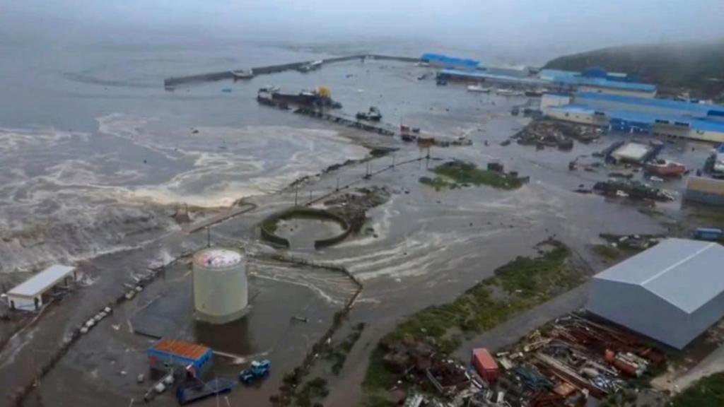 Tsunami makes its way across the Pacific, waves hitting the US West Coast